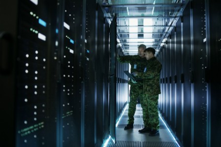 Military men in open server rack cabinet