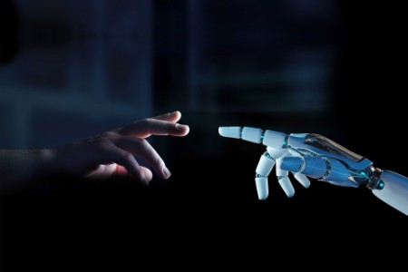 Robot finger about to touch human finger