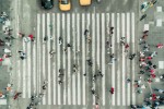 Aerial view of pedestrians on zebra crossing