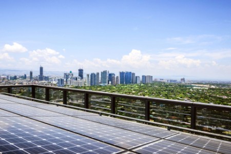 ey solar panels getting recharged on high rise towers