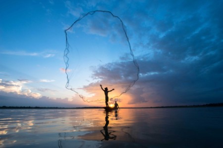 fisherman casting net