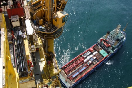 Unloading oilfield supply vessel