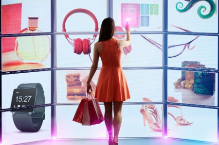 Woman touching screen and shopping