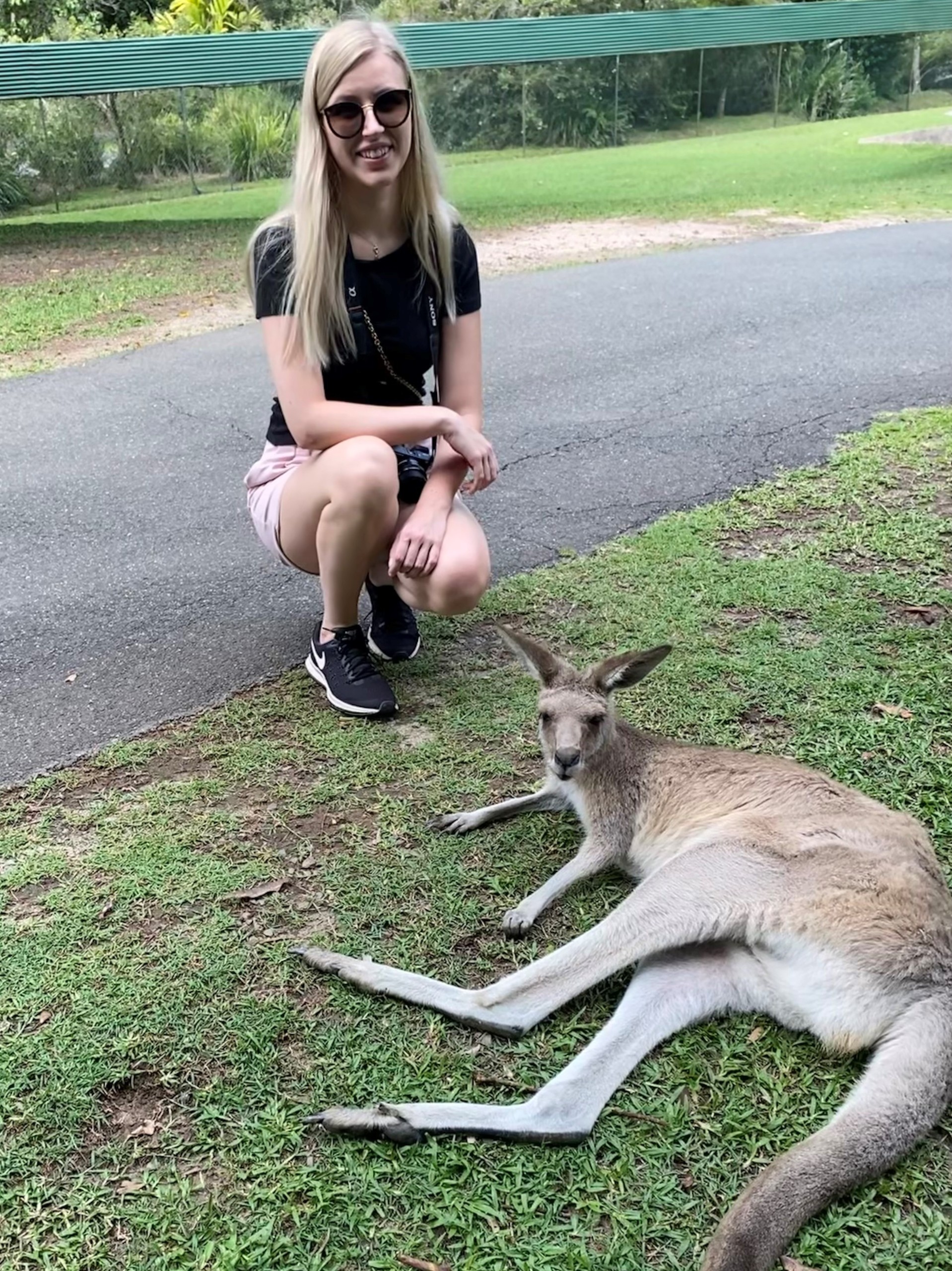 Women taking a photo with Kangaroo