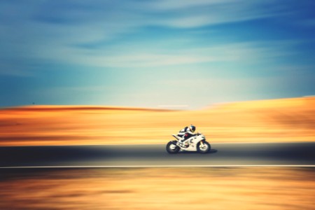 Motorbike speeding country road