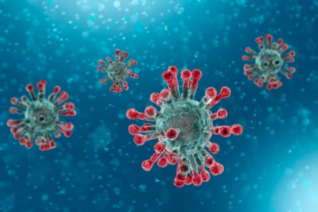 Koronaviruset på blå bakgrunn