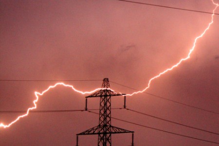Lightning hitting an electricity pylon