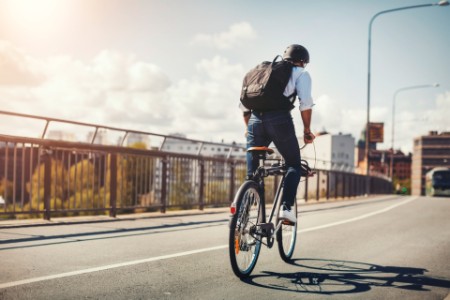 EY man riding a bicycle